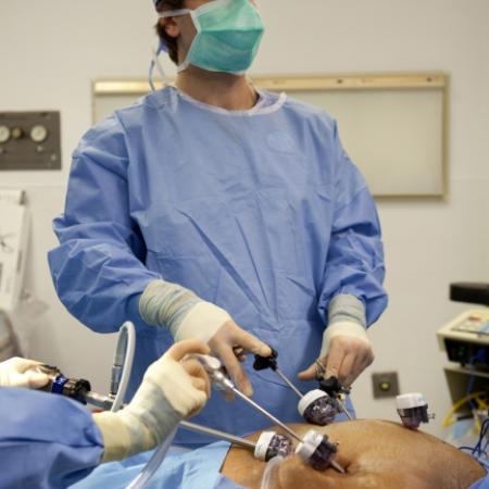 Scott Belsley, MD, FACS at operating table